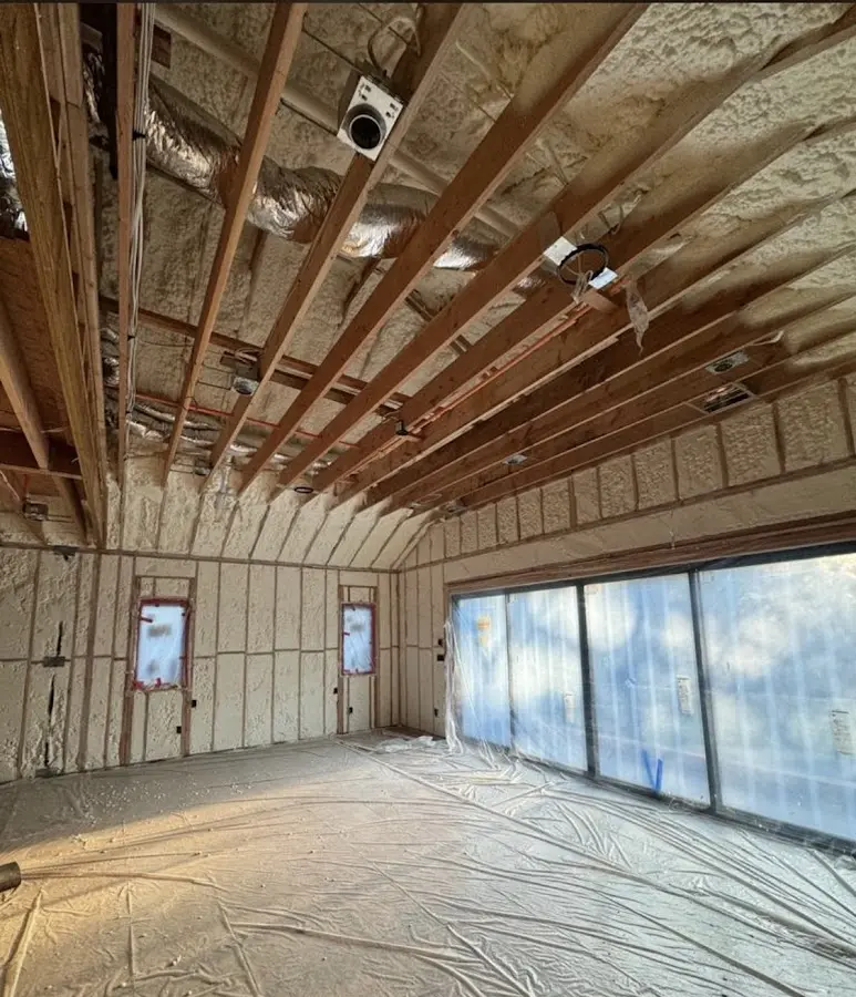 Interior walls and ceiling insulated with spray foam during new construction in West Chester
